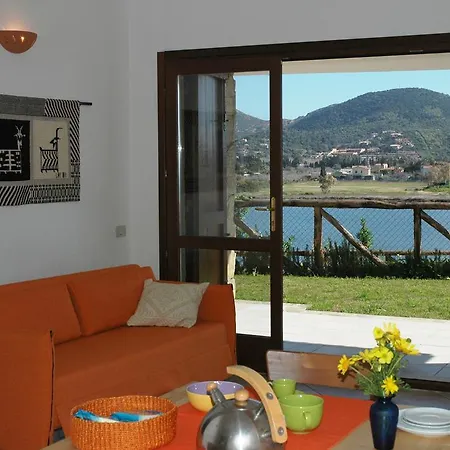 Case Sul Mare Residenze Di Bes Chia Exterior foto